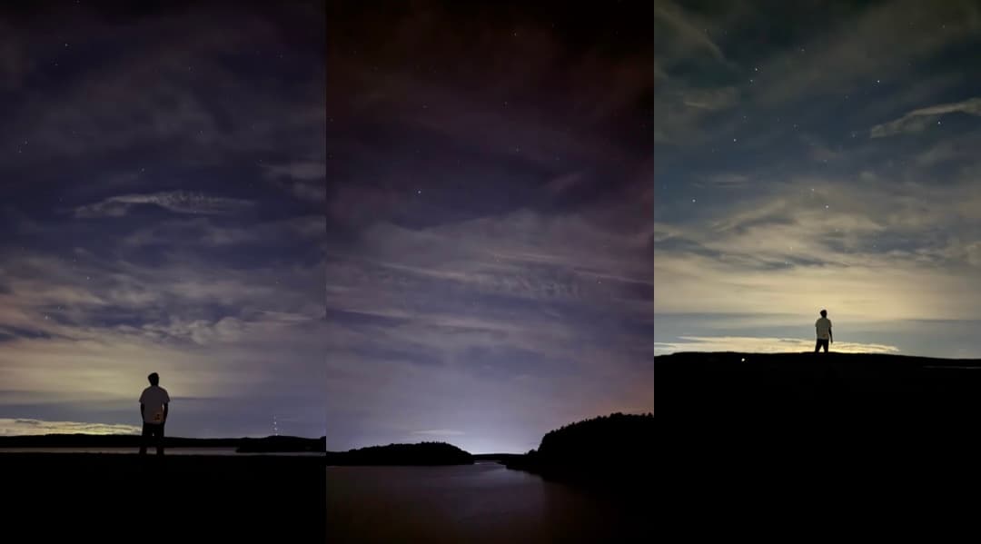 A figure standing alone beneath a night sky